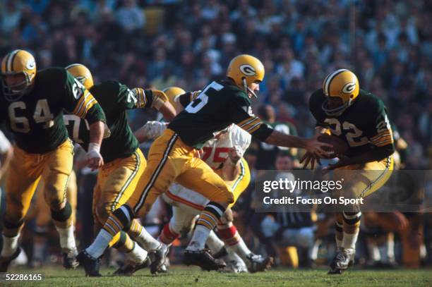 Green Bay Packers' quarterback Bart Starr hands off to Elijah Pitts during Super Bowl I against the Kansas City Chiefs at Memorial Coliseum on...