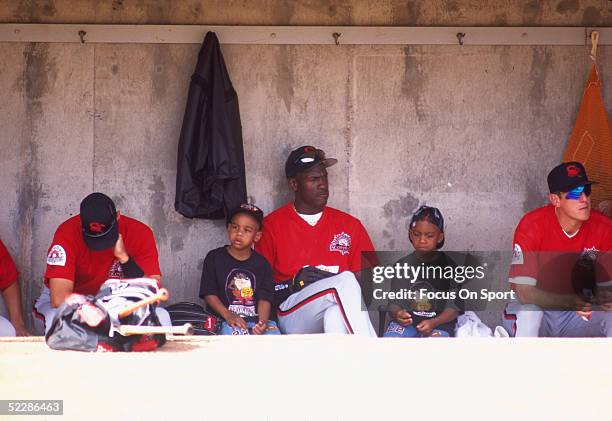 Scottsdale Scorpions' Michael Jordan sits on the bench in the visitors' dugout at Compadre Stadium in 1994 in Scottsdale, Arizona.