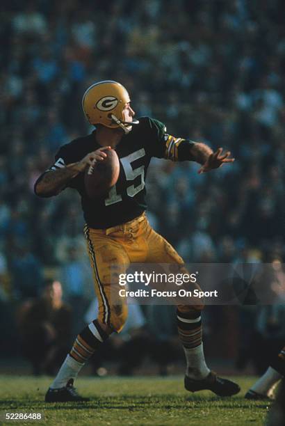 Green Bay Packers' quarterback Bart Starr steps back to pass against the Kansas City Chiefs' during Super Bowl I at Memorial Coliseum on January 15,...