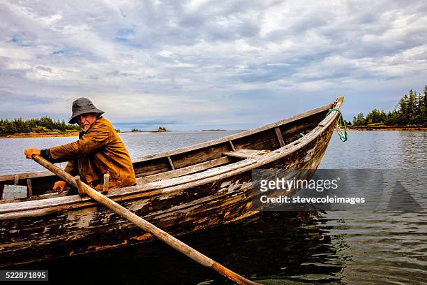 old man and the sea in a skiff - fisherman isolated stock pictures, royalty-free photos & images