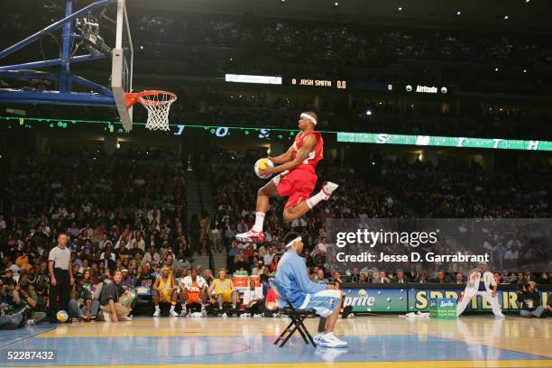 Josh Smith of the Atlanta Hawks leaps over Kenyon Martin of the Denver Nuggets in the Sprite Rising Stars Slam Dunk Competition during 2005 NBA...