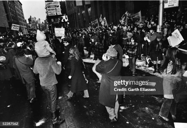 After the barricades are broken, demonstrators begin to spill into the streets in front of the Criminal Courts Building, New York, New York, February...