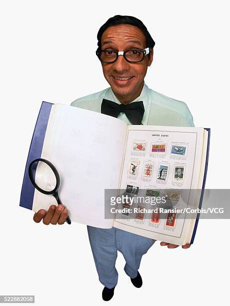 nerd with stamp collection - stamp collection stock pictures, royalty-free photos & images