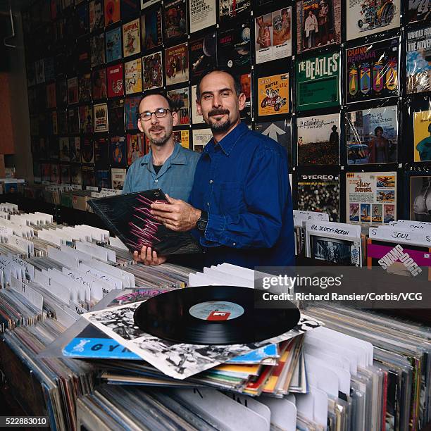 record store merchant with customer - record store stock pictures, royalty-free photos & images