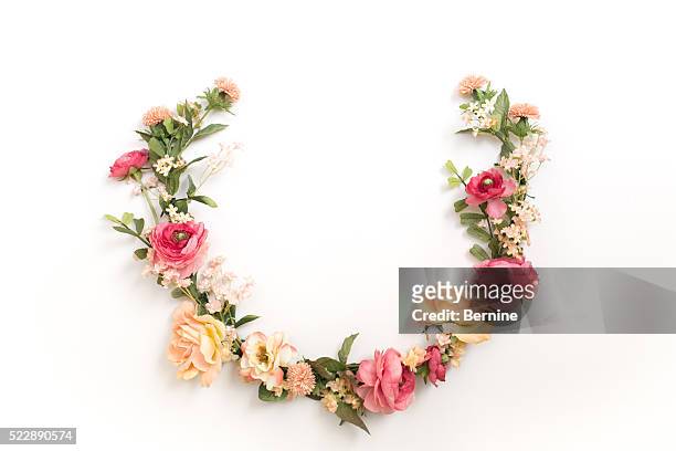 a laurel floral wreath on white background - blumenkrone stock-fotos und bilder