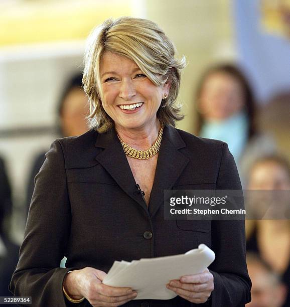 Martha Stewart smiles as she speaks to an audience of her employees and the media on her first day back to her offices since her incarceration March...
