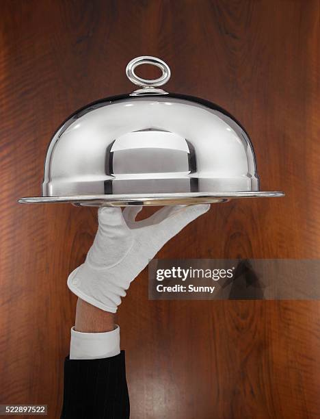 waiter carrying serving tray - dining presentation food stock-fotos und bilder