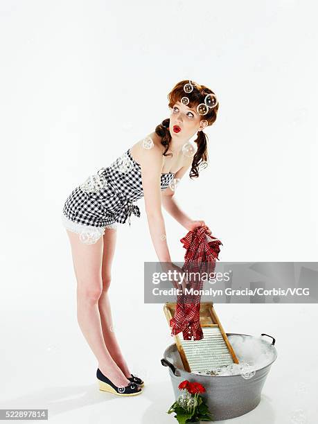 pinup washing clothes with washboards and basin - 40s pin up girls stock pictures, royalty-free photos & images