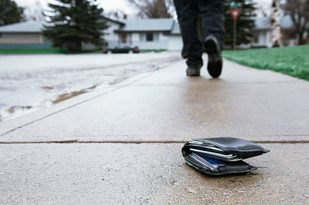 lost wallet on sidewalk - lost wallet stock pictures, royalty-free photos & images