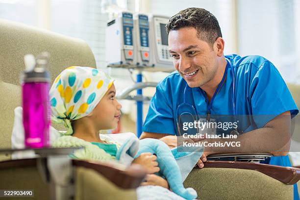 male doctor talking with patient ( 6-7) - outpatient care stock pictures, royalty-free photos & images