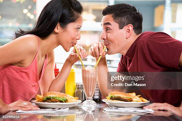 young couple having lunch - historical romance stock pictures, royalty-free photos & images