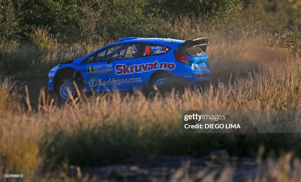 Henning Rally Driver Norwegian driver Henning Solberg steers his Ford Fiesta RS WRC with ...