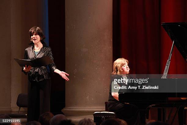 Actress Dame Harriet Walter portrays Clara Schumann as pianist Lucy Parham plays at a Steinway piano during a performance in 'Composers In Love:...
