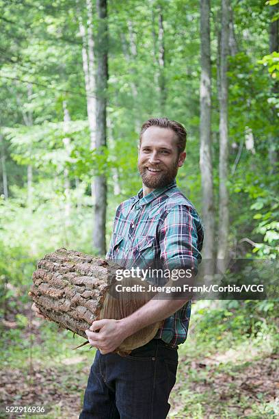 Log Man 716 Man Carrying Log Stock Photos, High-Res Pictures, and Images ...