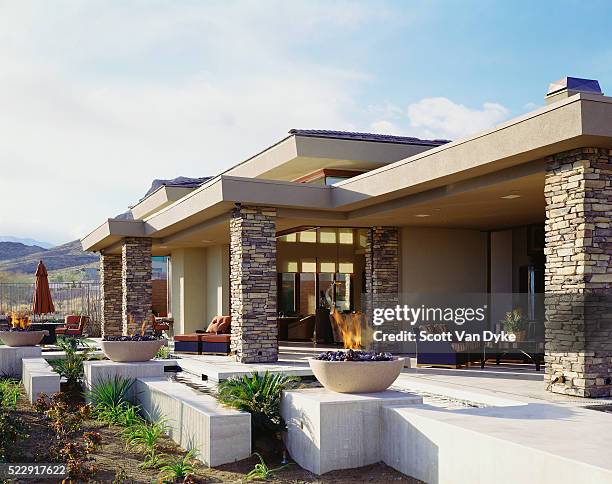 elevated patio behind contemporary home in desert - stone patio stock pictures, royalty-free photos & images