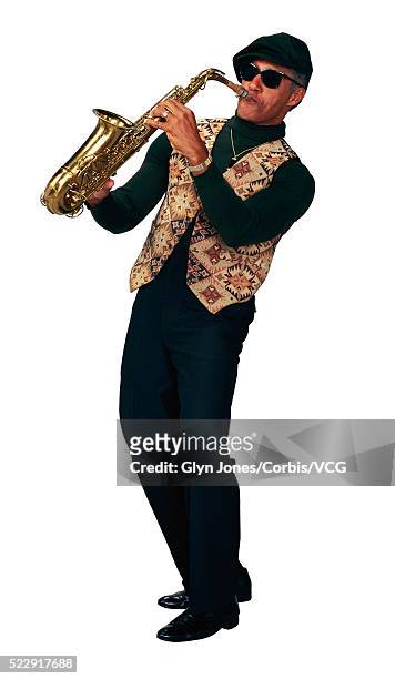 jazz musician playing an alto saxophone - saxophonist stock pictures, royalty-free photos & images