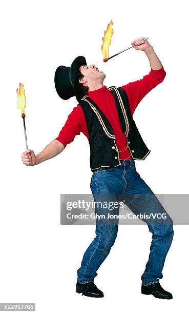 fire eater eating fire - fire performer stock pictures, royalty-free photos & images