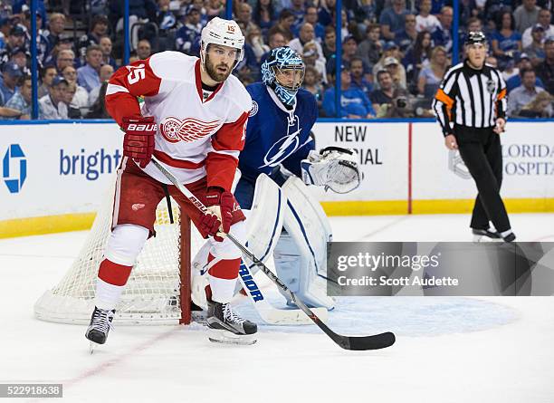 Goalie Ben Bishop of the Tampa Bay Lightning tends net against Riley Sheahan of the Detroit Red Wings during the second period of Game One of the...