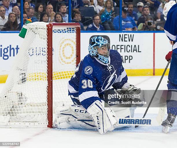 Goalie Ben Bishop of the Tampa Bay Lightning skates against the Detroit Red Wings during the second period of Game One of the Eastern Conference...
