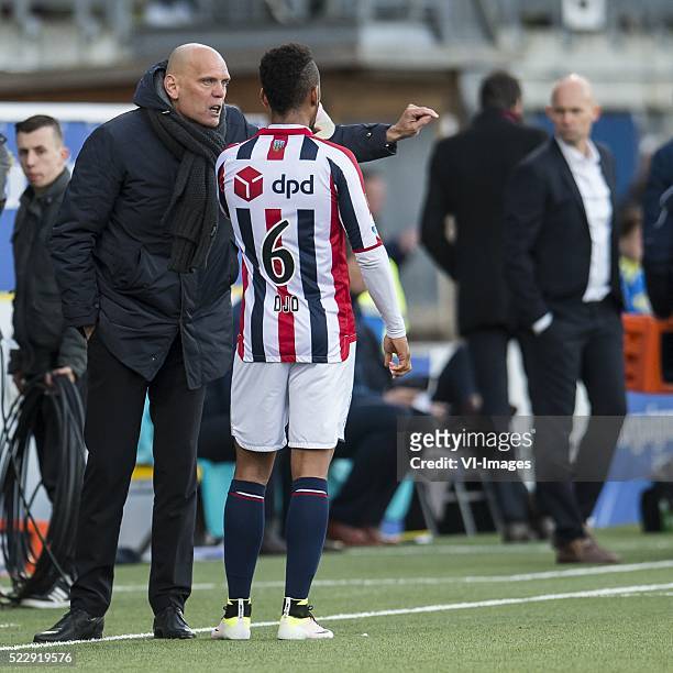 Coach Jurgen Streppel of Willem II give instructions to Funso Ojo of Willem II during the Dutch Eredivisie match between SC Cambuur and Willem II on...