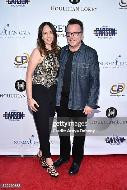 Ashley Groussman and Tom Arnold attend the Norma Jean Gala benefiting Hollygrove at Taglyan Complex on April 20, 2016 in Los Angeles, California.