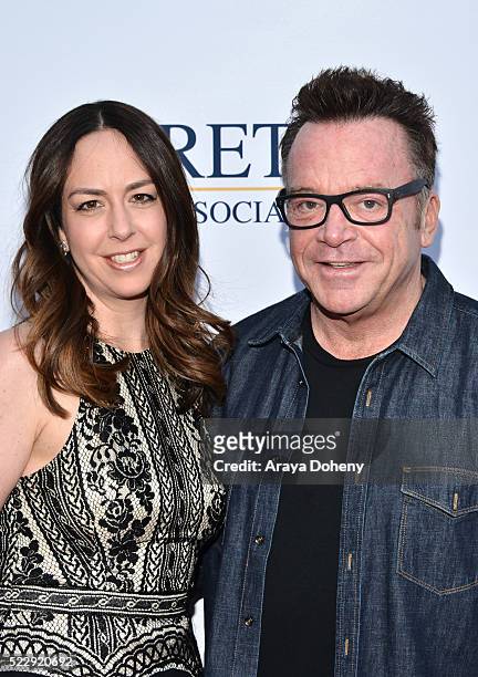 Ashley Groussman and Tom Arnold attend the Norma Jean Gala benefiting Hollygrove at Taglyan Complex on April 20, 2016 in Los Angeles, California.