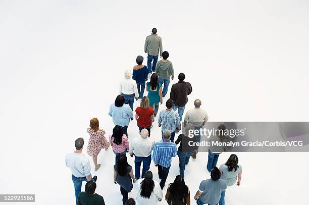 crowd of people marching - following behind stock pictures, royalty-free photos & images