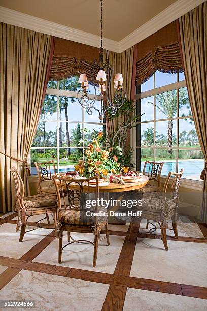 wood and marble floor in dining area - curtain valance stock pictures, royalty-free photos & images