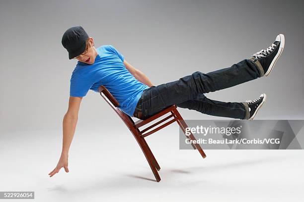 Slipping From Rocking Chair 1.377 Falling Out Of Chair Stock Photos, High-Res Pictures, and Images ...