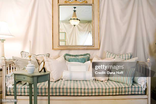 romantic living room with fabric-draped walls - antique sofa styles foto e immagini stock