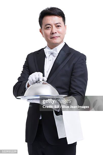 happy waiter serving food - domed tray stock pictures, royalty-free photos & images