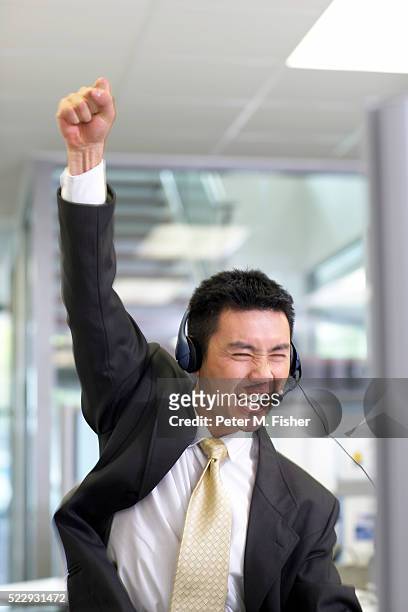 successful salesman - fist raised stock pictures, royalty-free photos & images