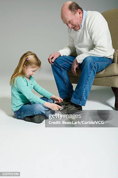 grandfather and granddaughter - senior man grey long hair stock pictures, royalty-free photos & images