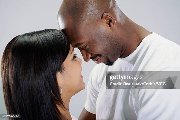 happy couple - couples studio portrait stock pictures, royalty-free photos & images