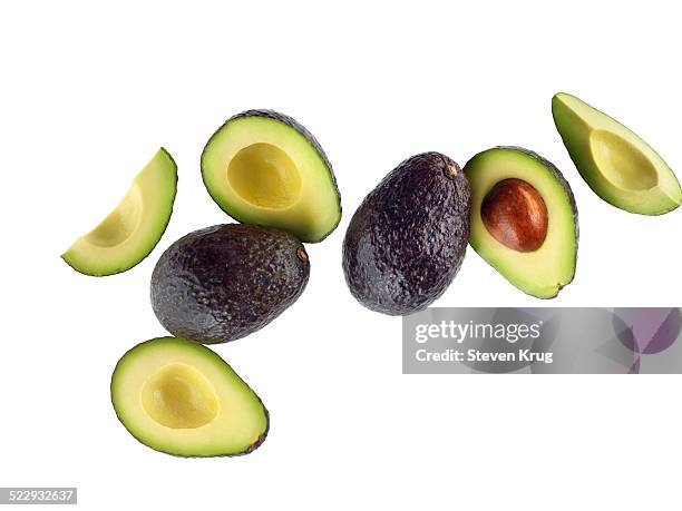 avocados - avocado isolated stock-fotos und bilder