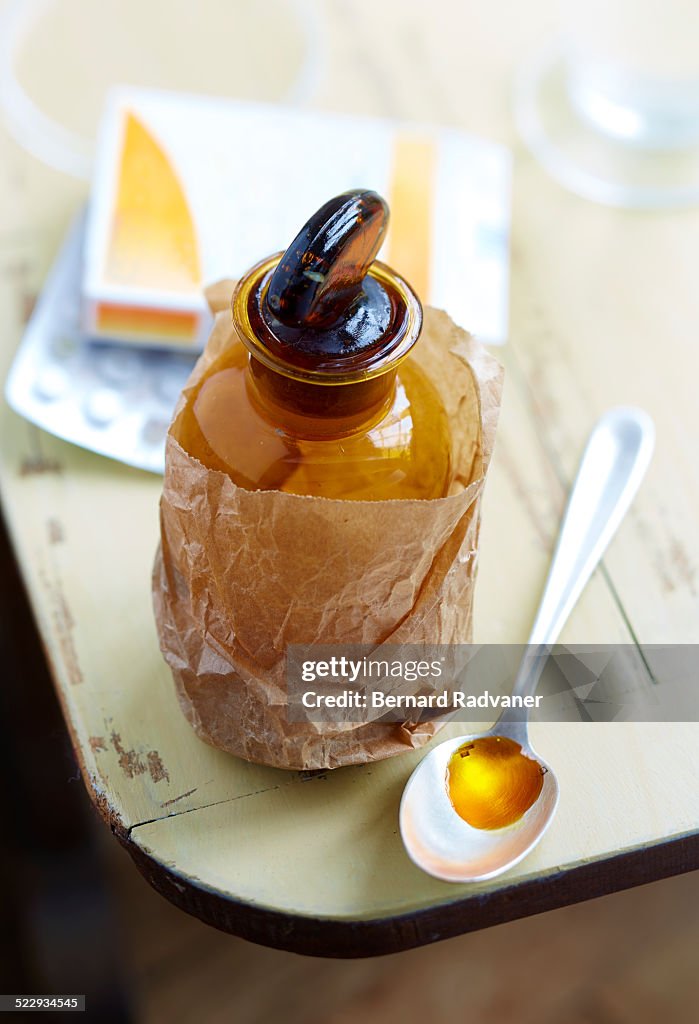 Syrup and medicine tablet