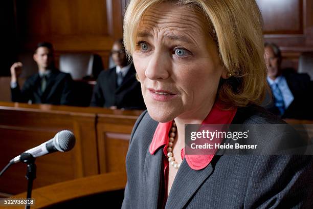 witness testifying during trial - witness fotografías e imágenes de stock