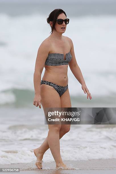 Glenn and Sarah McGrath and their family pictured enjoying a beach outing while holidaying on April 18, 2016 in Byron Bay, Australia.