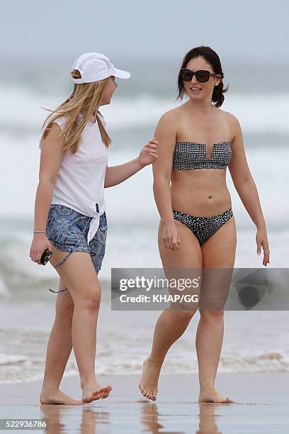 Glenn and Sarah McGrath and their family pictured enjoying a beach outing while holidaying on April 18, 2016 in Byron Bay, Australia.