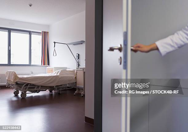 doctor entering empty hospital room - entering hospital stock pictures, royalty-free photos & images
