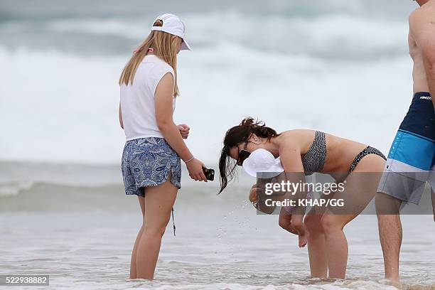 Glenn and Sarah McGrath and their family pictured enjoying a beach outing while holidaying on April 18, 2016 in Byron Bay, Australia.