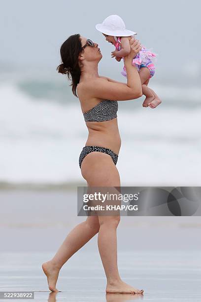 Glenn and Sarah McGrath and their family pictured enjoying a beach outing while holidaying on April 18, 2016 in Byron Bay, Australia.