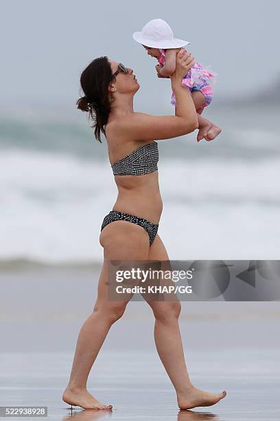 Glenn and Sarah McGrath and their family pictured enjoying a beach outing while holidaying on April 18, 2016 in Byron Bay, Australia.