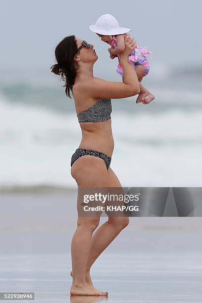 Glenn and Sarah McGrath and their family pictured enjoying a beach outing while holidaying on April 18, 2016 in Byron Bay, Australia.