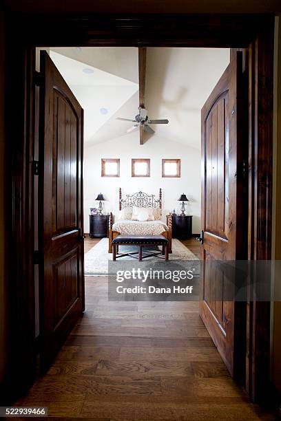 double doors to traditional style bedroom - bedroom doorway stock pictures, royalty-free photos & images