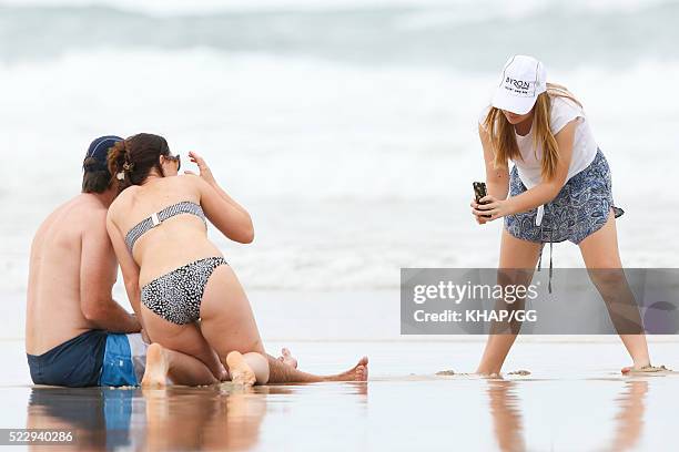 Glenn and Sara McGrath pictured enjoying a beach outing with their family on April 18, 2016 in Byron Bay, Australia.