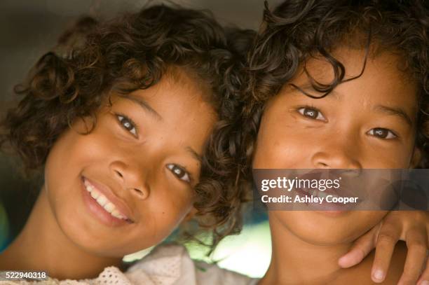 close-up of tuvaluan sisters - tuvalu stock pictures, royalty-free photos & images