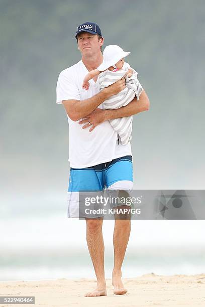 Glenn and Sara McGrath pictured enjoying a beach outing with their family on April 18, 2016 in Byron Bay, Australia.