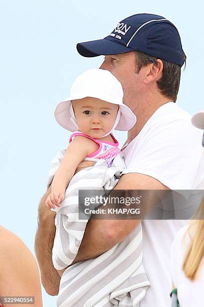 Glenn and Sara McGrath pictured enjoying a beach outing with their family on April 18, 2016 in Byron Bay, Australia.