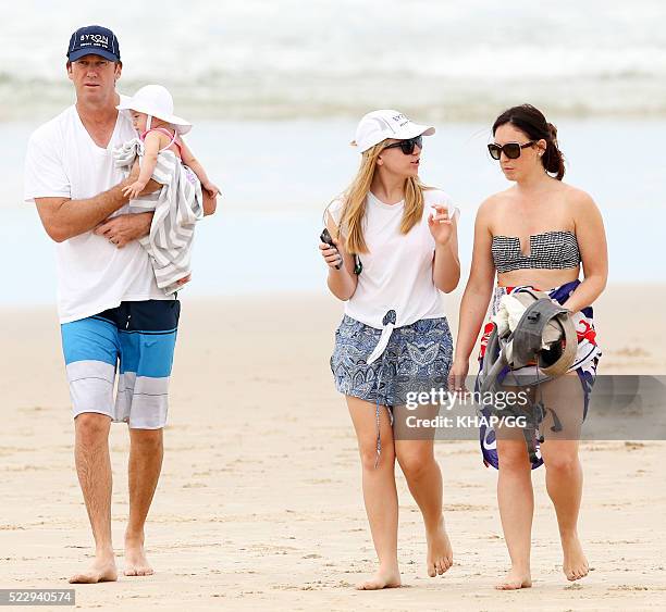 Glenn and Sara McGrath pictured enjoying a beach outing with their family on April 18, 2016 in Byron Bay, Australia.